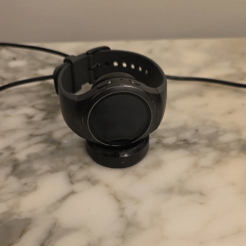 Samsung Smartwatch with Charging Stand.